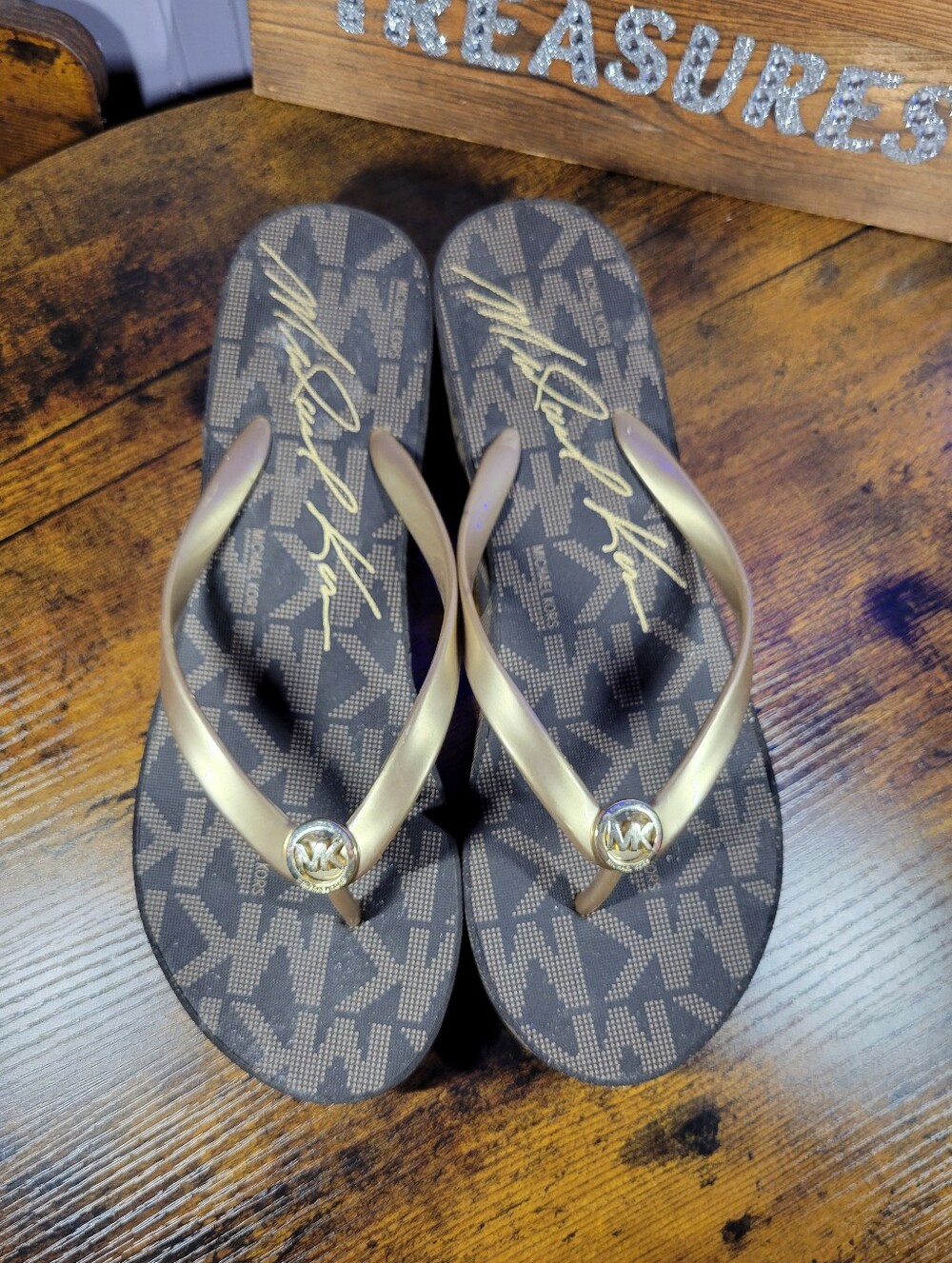 Michael Kors Brown Monogram Flip Flop Sandals with Gold Straps